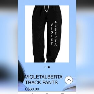 Black Sweatpants with White Lettering
